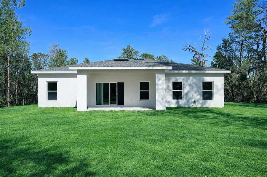 Exterior details and patio area of a home in , Ocala (Image 24).