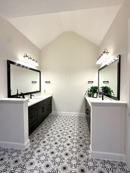 Dual vanities with a raised ceiling at Master Bath Dual vanities with a raised ceiling at Master Bath