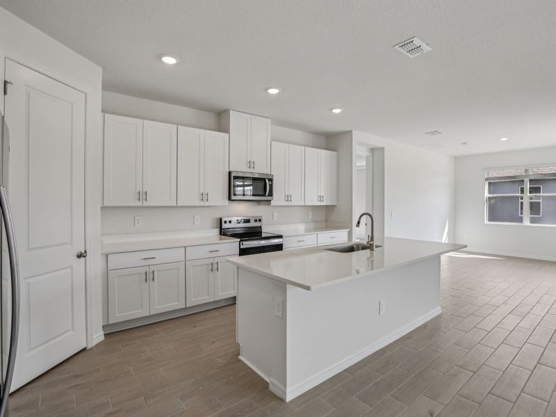 Furnished interior view inside a new home in Coasterra - Reserve Series, Palmetto (Image 3).