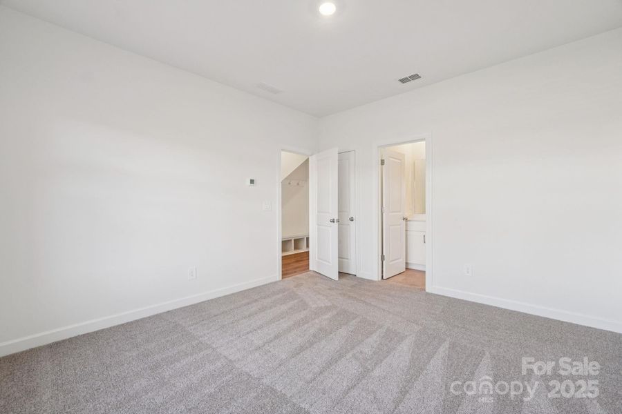 Spacious, unfurnished interior of a new home in Meadows at Wilson Farms - The Heights Series, Fort Mill (Image 21). Spacious, unfurnished interior of a new home in Meadows at Wilson Farms - The Heights Series, Fort Mill (Image 21).