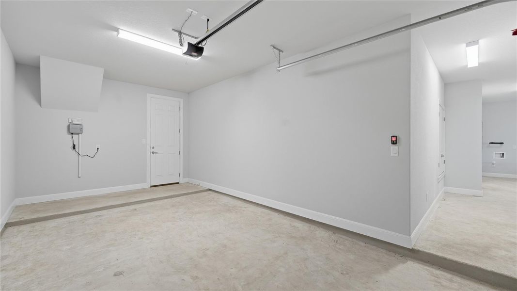 Garage with baseboards Garage with baseboards