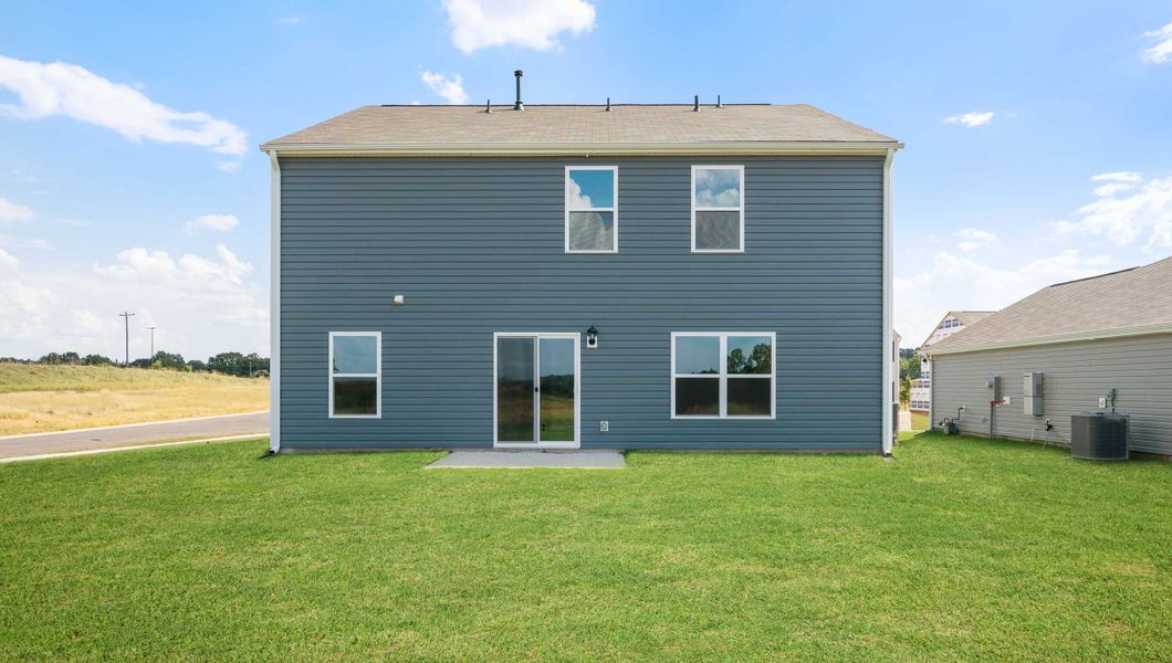 Front exterior of a new home in Cedar Gap, Fountain Inn, SC, highlighting curb appeal (Image 19). Front exterior of a new home in Cedar Gap, Fountain Inn, SC, highlighting curb appeal (Image 19).
