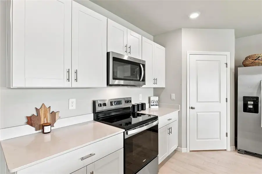 Furnished interior view inside a new home in Central Parc, North Port (Image 6). Furnished interior view inside a new home in Central Parc, North Port (Image 6).