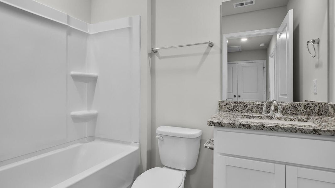 Furnished interior view inside a new home in Waterside Townhomes, Surf City (Image 10).