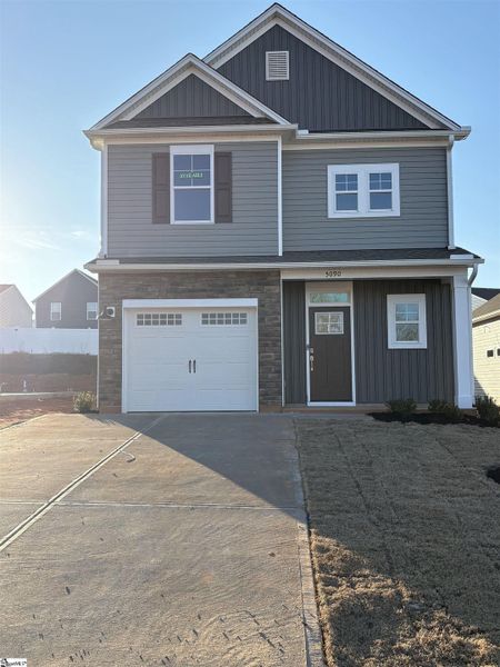 Front exterior of a new home in Hazelwood, Boiling Springs, SC, highlighting curb appeal (Image 1). Front exterior of a new home in Hazelwood, Boiling Springs, SC, highlighting curb appeal (Image 1).