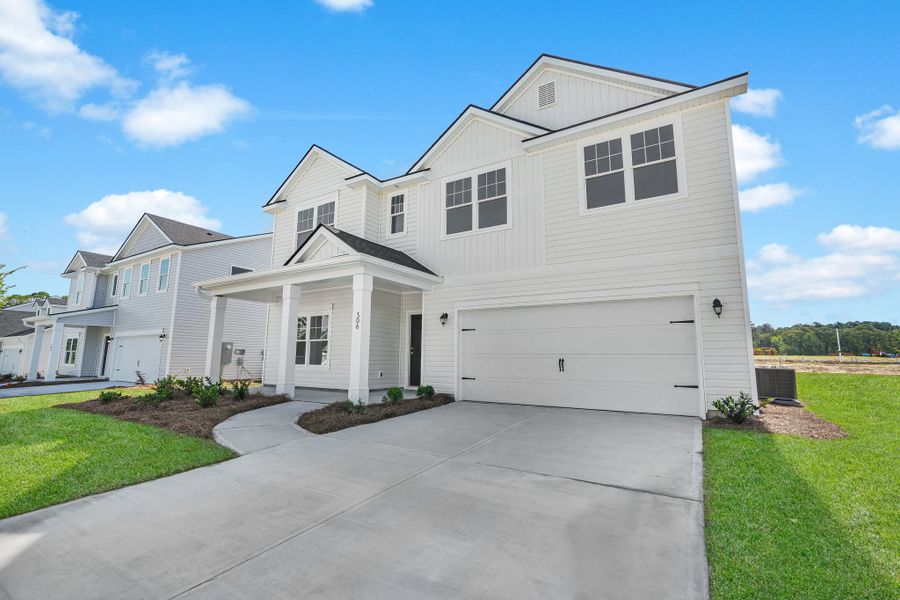 Front exterior of a new home in Belair East, Statesboro, GA, highlighting curb appeal (Image 19).
