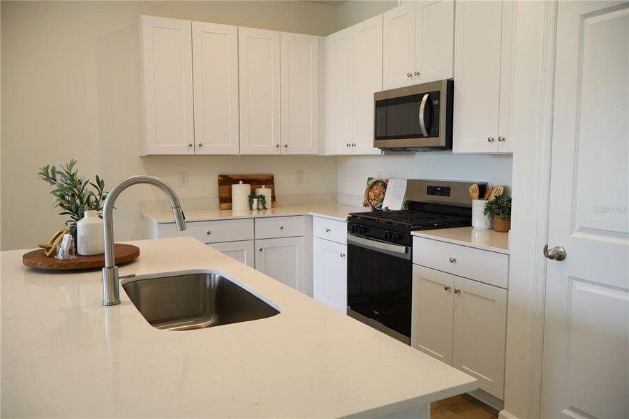 Furnished interior view inside a new home in , Okahumpka (Image 3).