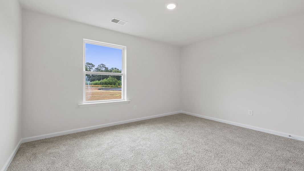 Spacious, unfurnished interior of a new home in Bentley Park, Greenwood (Image 23).