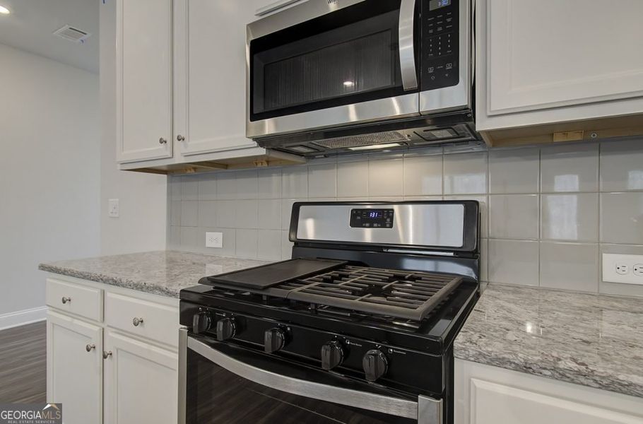 Furnished interior view inside a new home in Kentmere, Auburn (Image 9).