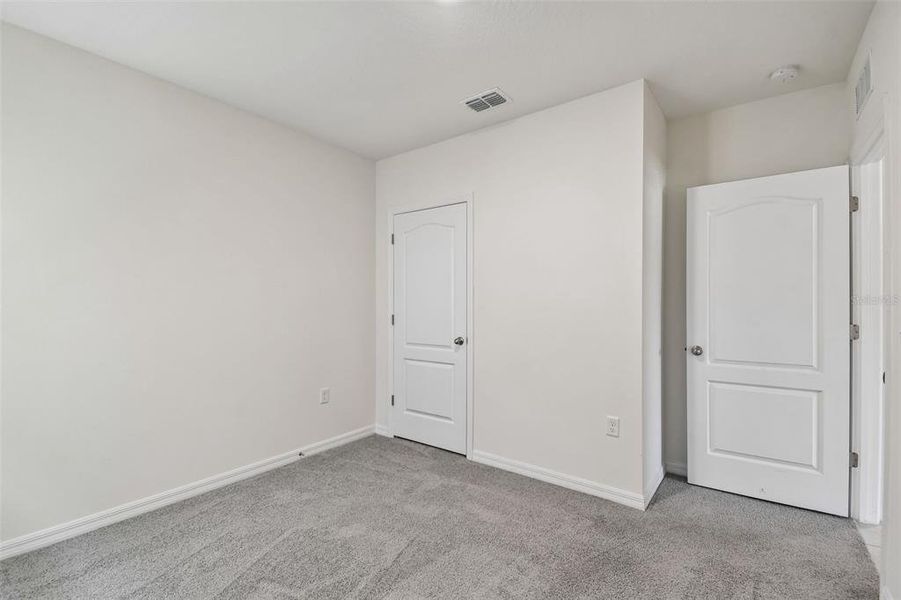 Spacious, unfurnished interior of a new home in Riviera Bella, Debary (Image 24).