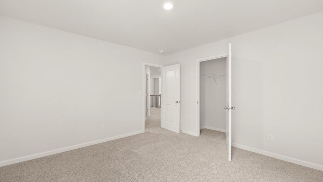 Representative unfurnished interior of a home built from the Grayson by D.R. Horton in Holland Estates, Powder Springs (Image 32).