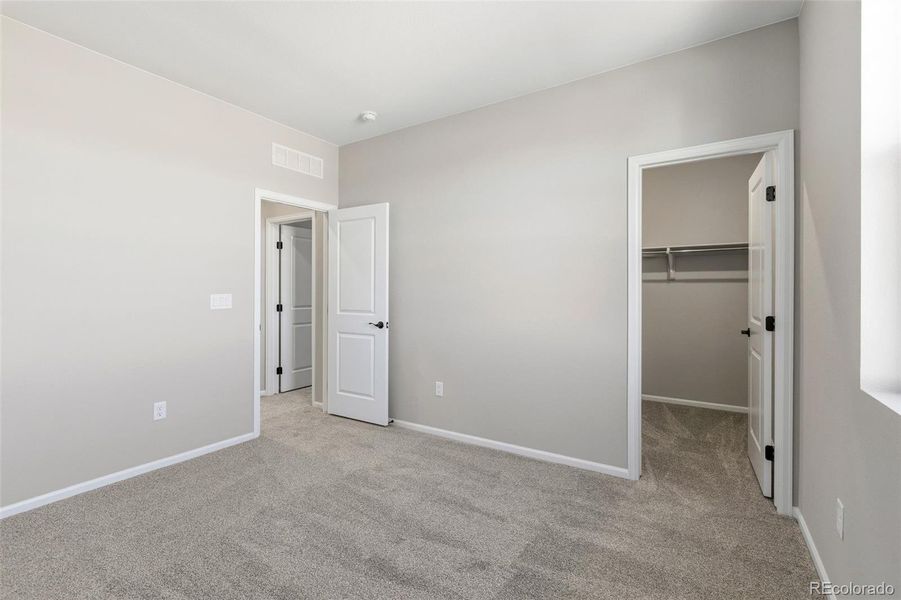 Spacious, unfurnished interior of a new home in The Estates Collection at Talon Pointe, Thornton (Image 31).