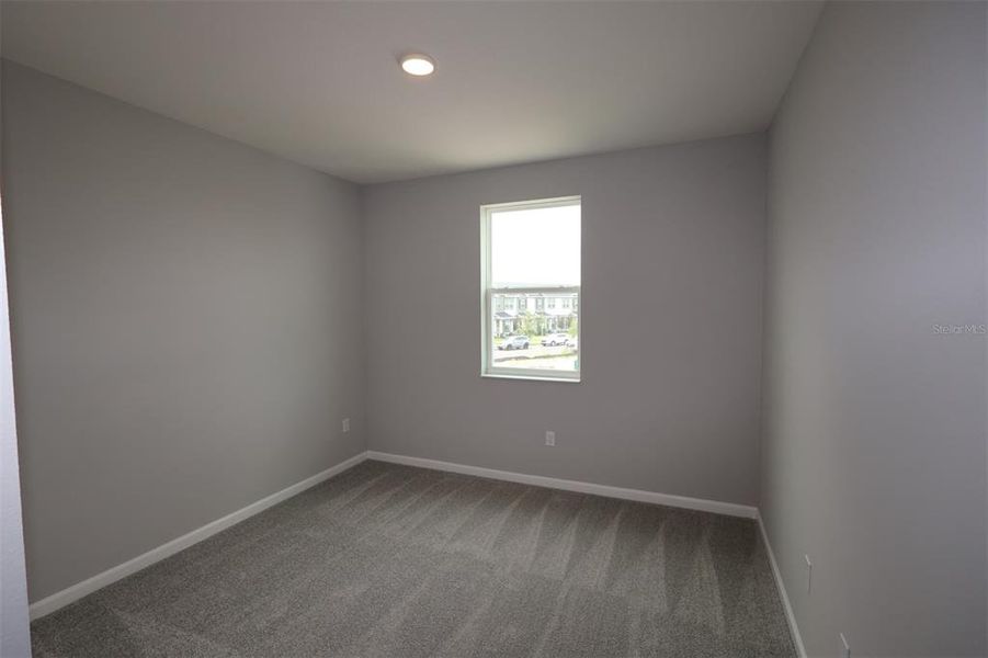 Spacious, unfurnished interior of a new home in Center Lake on the Park, St. Cloud (Image 51).
