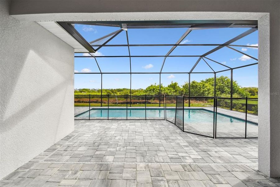 Exterior details and patio area of a home in Palmera Wellen Park - Classic Series, Venice (Image 2).