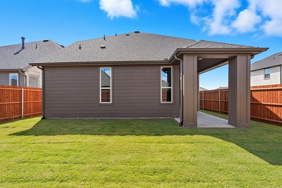 Exterior details and patio area of a home in Heartland, Heartland (Image 2). Exterior details and patio area of a home in Heartland, Heartland (Image 2).