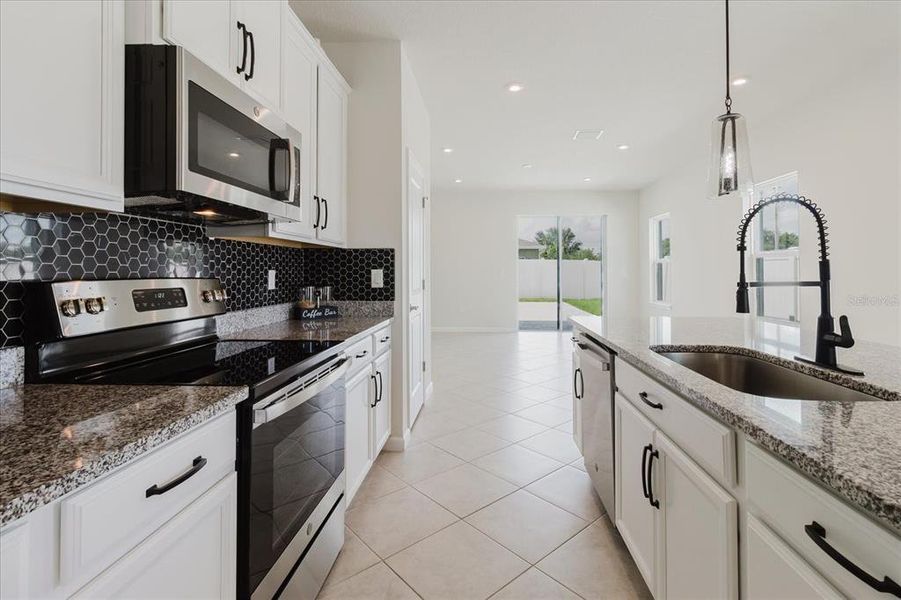 Furnished interior view inside a new home in Conner Crossing, Spring Hill (Image 11).