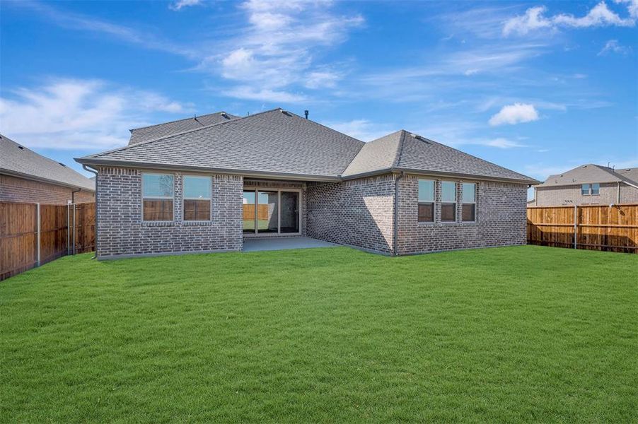 Exterior details and patio area of a home in Timberbrook, Justin (Image 3).