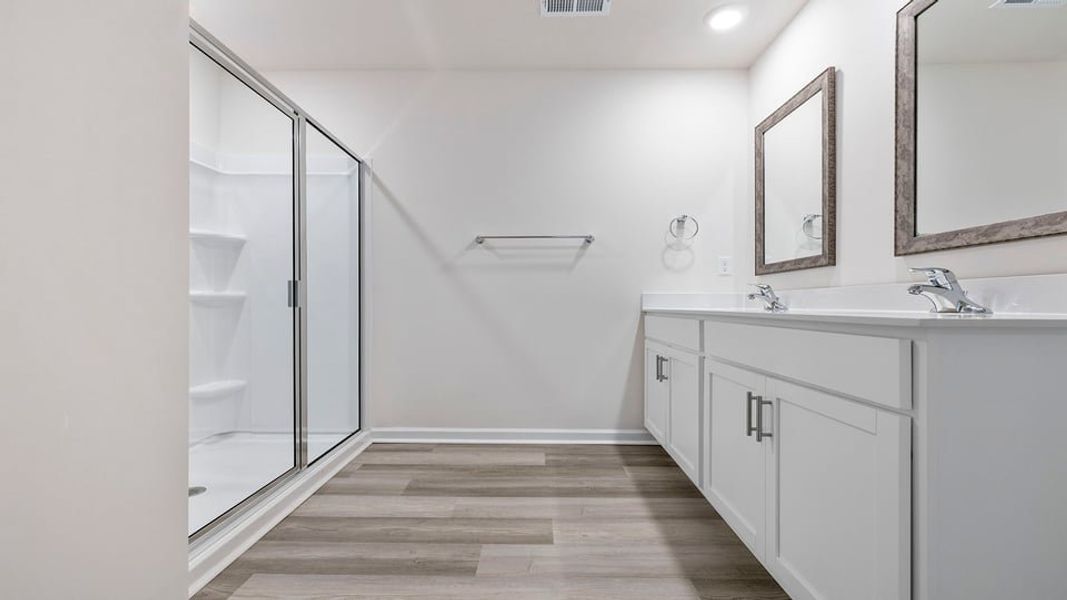 Furnished interior view inside a new home in Bentley Park, Greenwood (Image 10).
