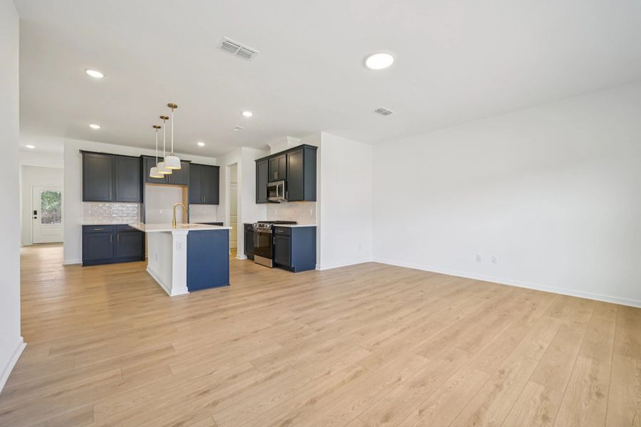 Family Room featuring the AW Collection® Sapphire - Bold tones and playful patterns shine here.