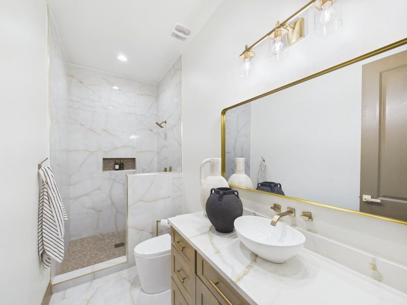 Secondary and guest bathroom with walk in shower and modern finishes