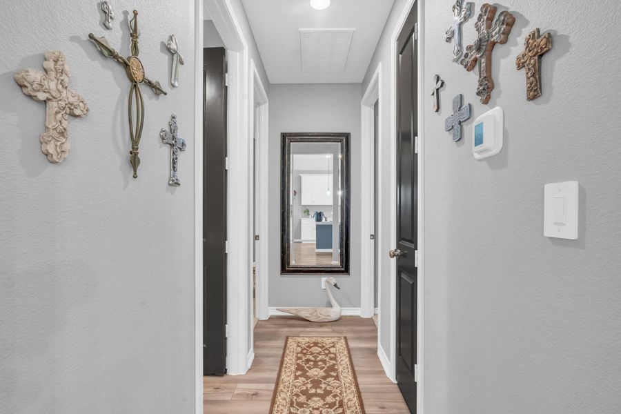 Main hallway with custom paint on walls and doors. Main hallway with custom paint on walls and doors.