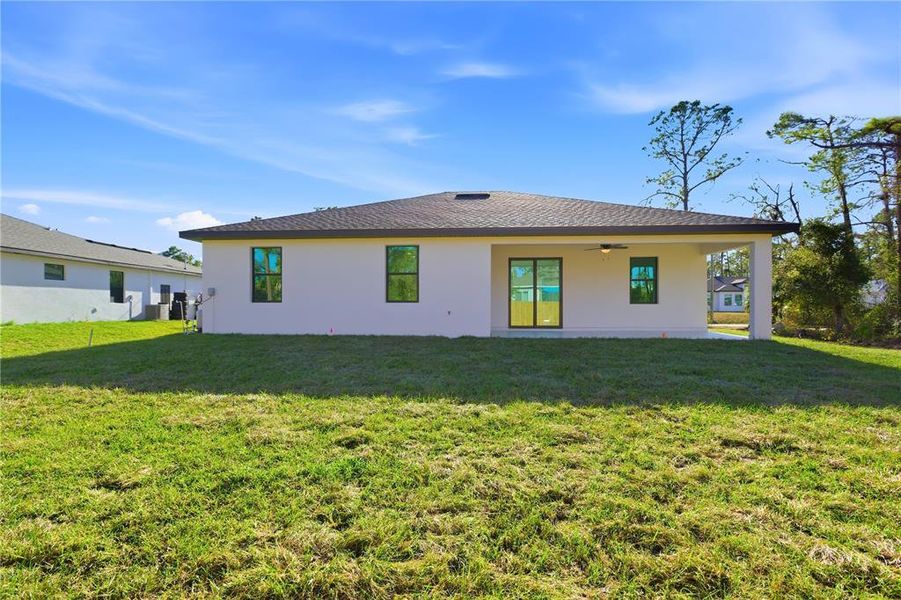 Exterior details and patio area of a home in , North Port (Image 22).