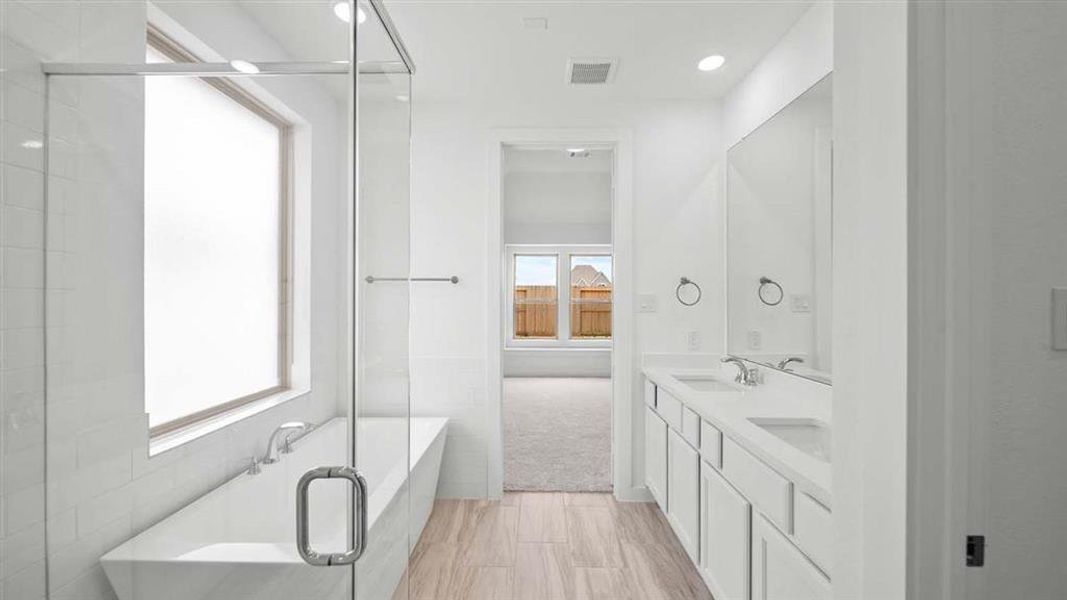 Primary Bathroom with freestanding tub