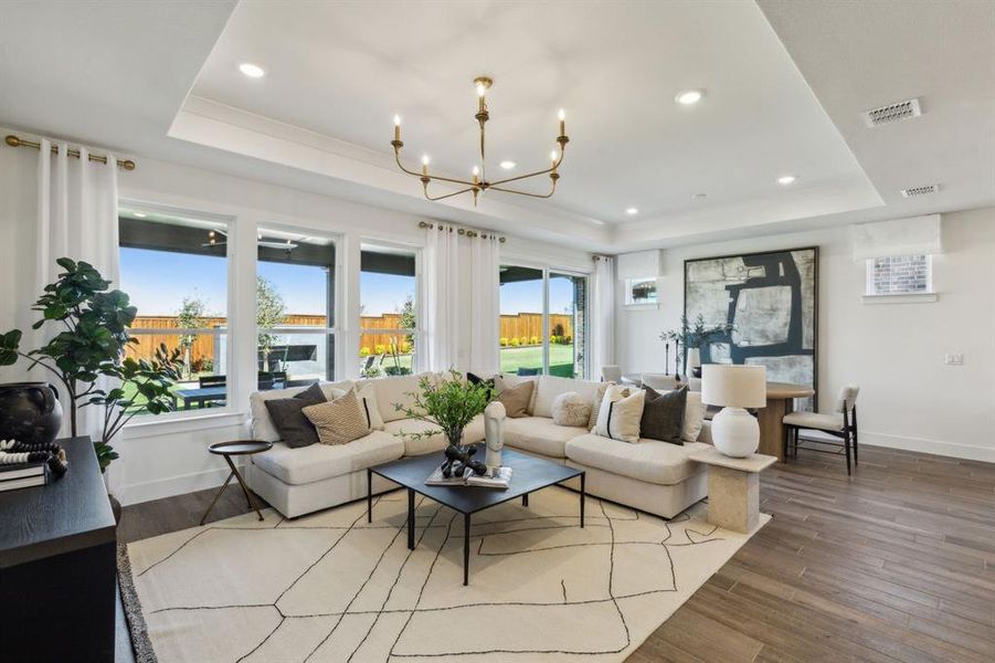 Model Representation* - Gathering room with view of main living areas