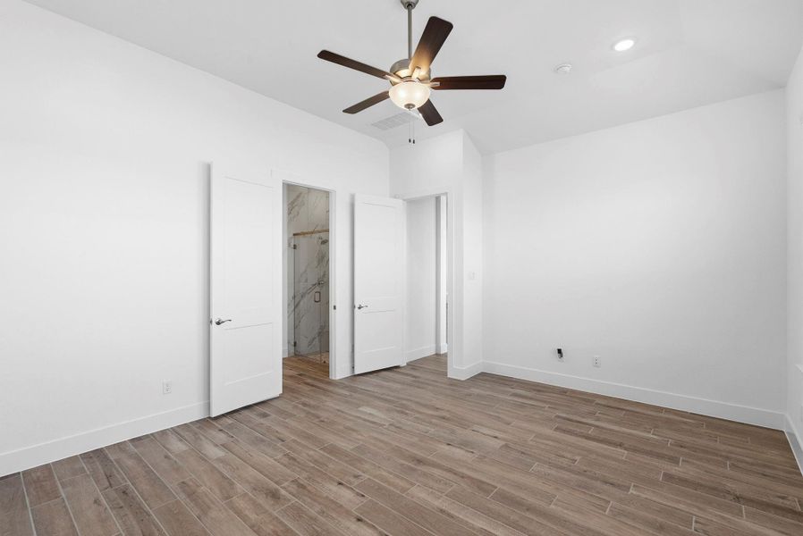 Spacious, unfurnished interior of a new home in Meridiana, Manvel (Image 14).