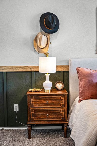 Primary bedroom in the model home located in Carillon at 13305 Eppright Trace Blvd., Manor, TX Primary bedroom in the model home located in Carillon at 13305 Eppright Trace Blvd., Manor, TX
