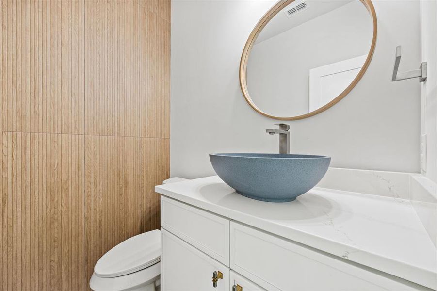 Bathroom with vanity and toilet