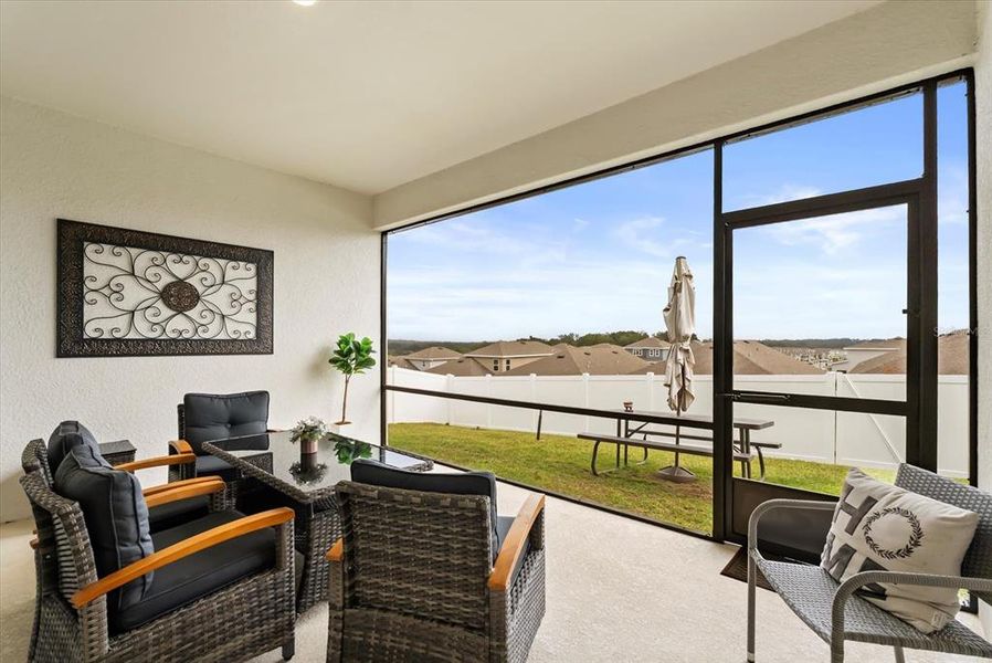 Exterior details and patio area of a home in Hills of Minneola, Minneola (Image 22).