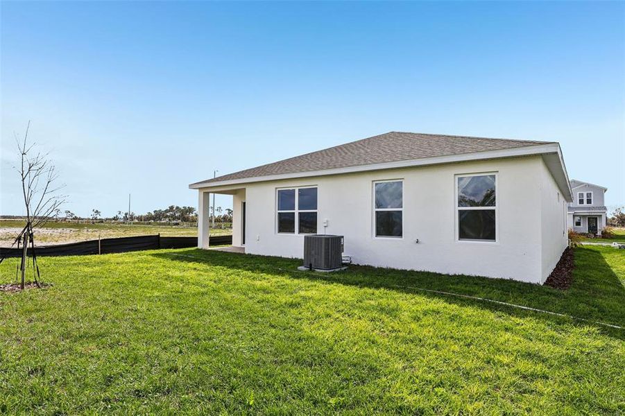 Exterior details and patio area of a home in Willowbrook North, Winter Haven (Image 17).