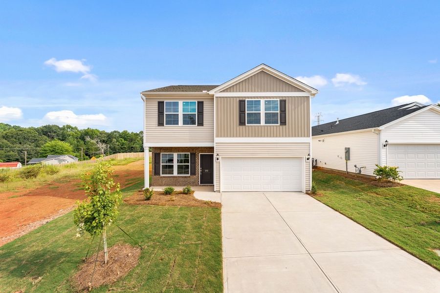Front exterior of a new home in Mayfair Village, Spartanburg, SC, highlighting curb appeal (Image 1). Front exterior of a new home in Mayfair Village, Spartanburg, SC, highlighting curb appeal (Image 1).