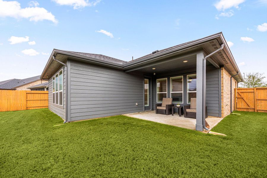 Exterior details and patio area of a home in Bonterra at Cross Creek Ranch 45s - Age 55+, Fulshear (Image 23).