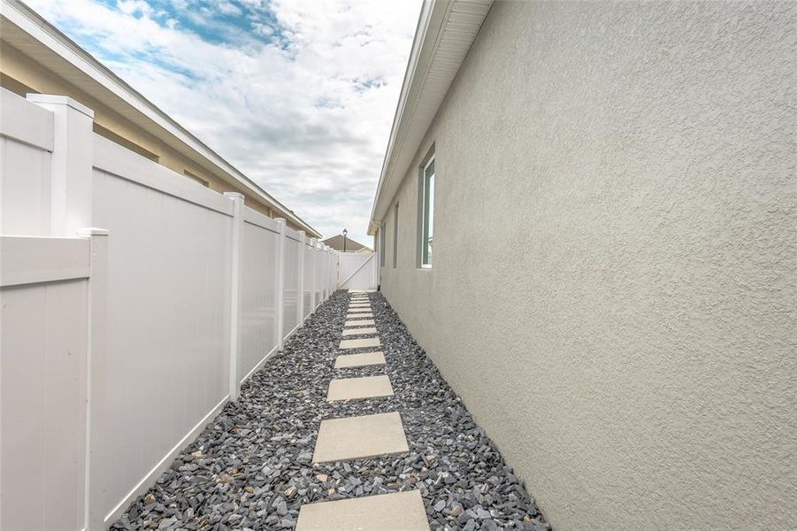 Exterior details and patio area of a home in Harmony West, Harmony (Image 34). Exterior details and patio area of a home in Harmony West, Harmony (Image 34).