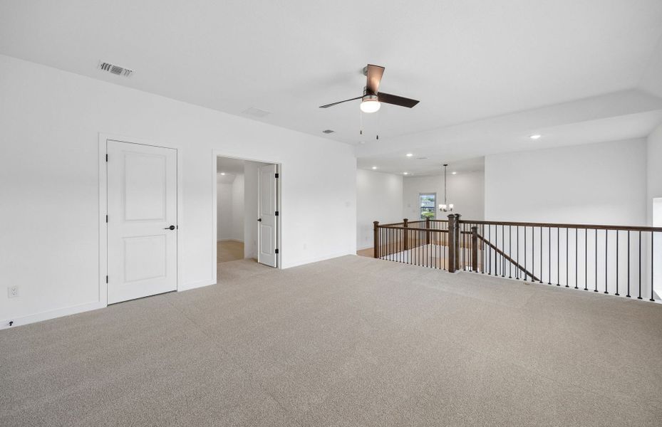 Representative unfurnished interior of a home built from the Wheeler by Pulte Homes in West Cypress Hills, Spicewood (Image 30).