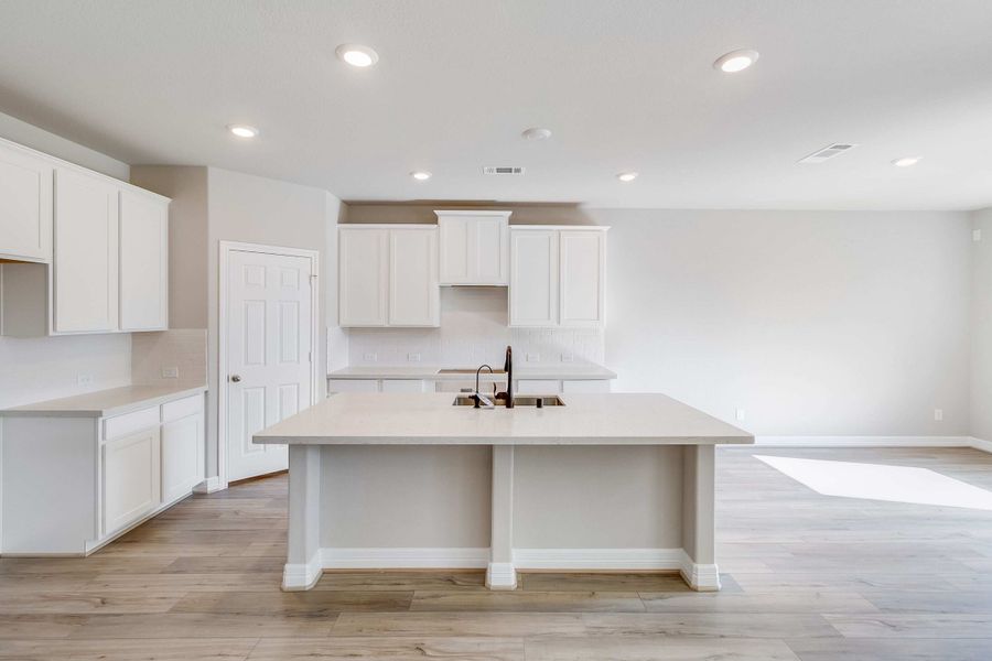 Kitchen. Note: Sample product photo - actual exterior and interior selections may vary by homesite