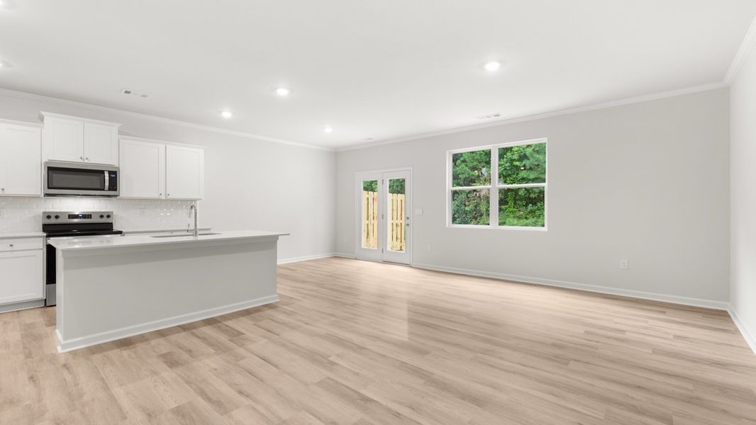 Representative unfurnished interior of a home built from the Salisbury by D.R. Horton in Waypoint, Flowery Branch (Image 14).