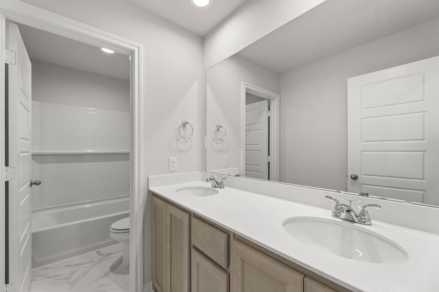 Front exterior of a new home in Creekside Ranch, Blue Ridge, TX, highlighting curb appeal (Image 27).