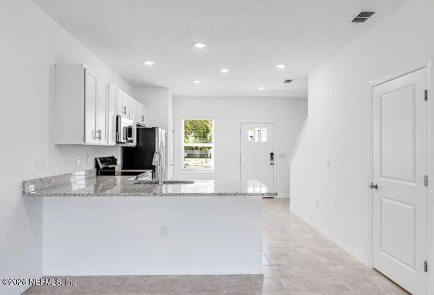 Furnished interior view inside a new home in , Jacksonville (Image 4).