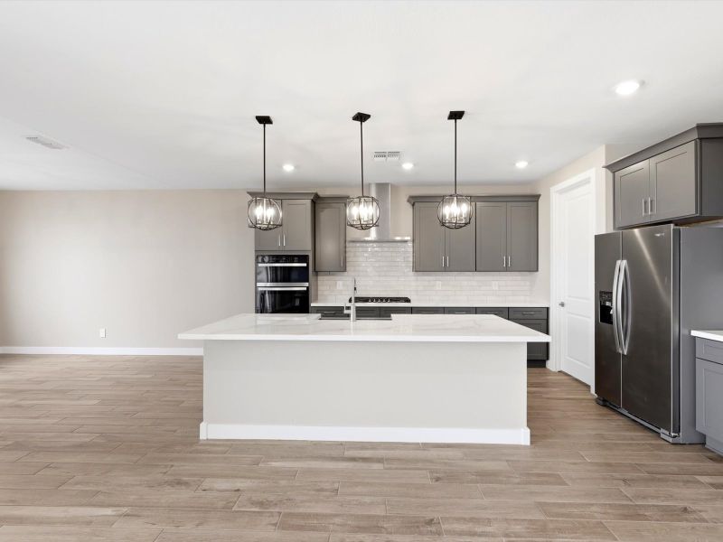 Furnished interior view inside a new home in Blossom Rock Signature Series, Apache Junction (Image 3).