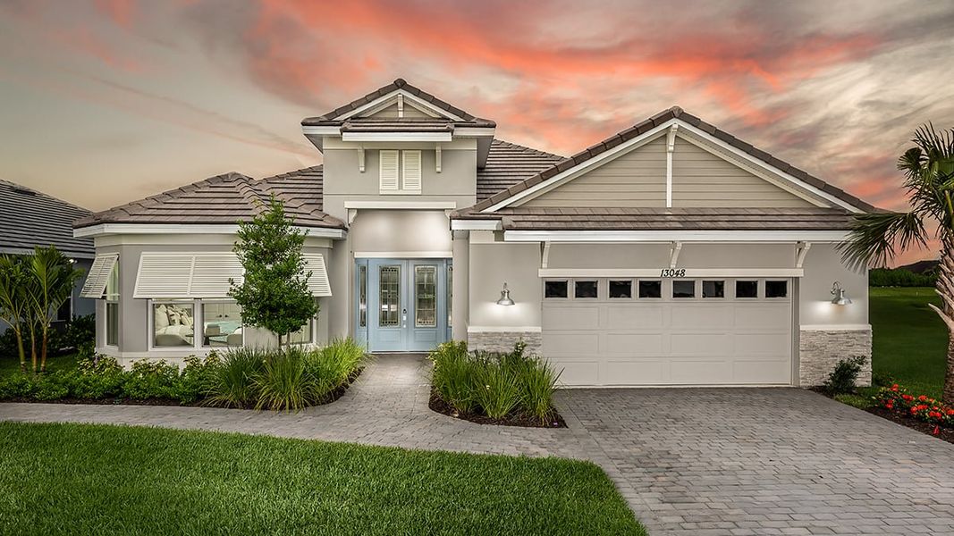 Representative exterior photo of a completed home built from the Pallazio by Taylor Morrison in Astor Creek Golf and Country Club, Port St. Lucie, FL (Image 26).
