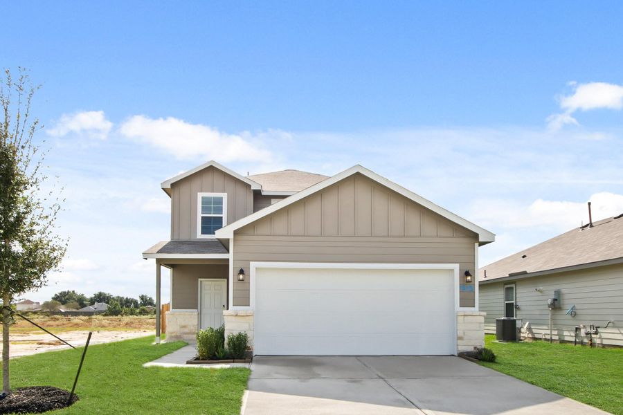 Front exterior of a new home in The Villages at Westpointe, Dayton, TX, highlighting curb appeal (Image 12). Front exterior of a new home in The Villages at Westpointe, Dayton, TX, highlighting curb appeal (Image 12).