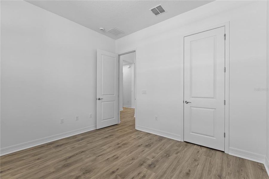 Spacious, unfurnished interior of a new home in The Reserve at Victoria, Deland (Image 22).