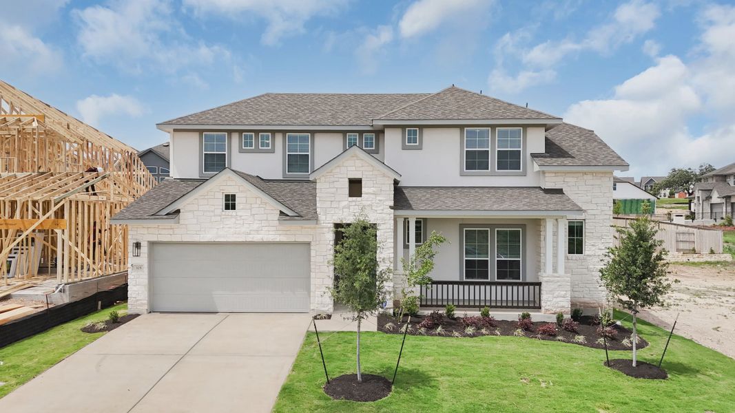 Front exterior of a new home in Lariat, Liberty Hill, TX, highlighting curb appeal (Image 1). Front exterior of a new home in Lariat, Liberty Hill, TX, highlighting curb appeal (Image 1).