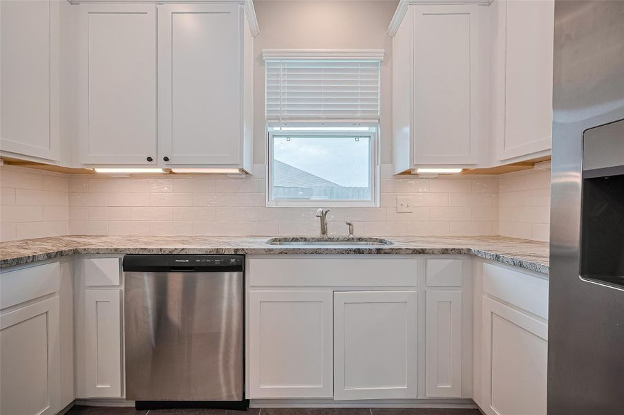 Furnished interior view inside a new home in Sunterra, Katy (Image 7).