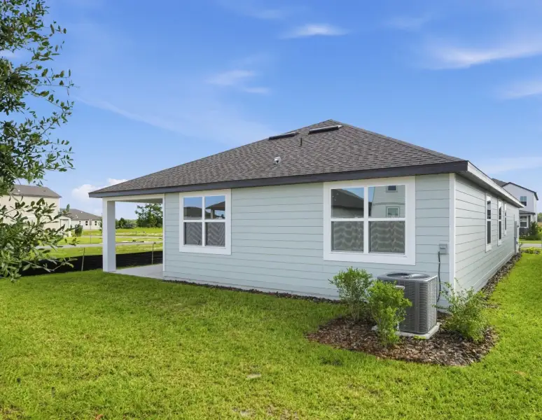 Exterior details and patio area of a home in Trailside, Mount Dora (Image 19).
