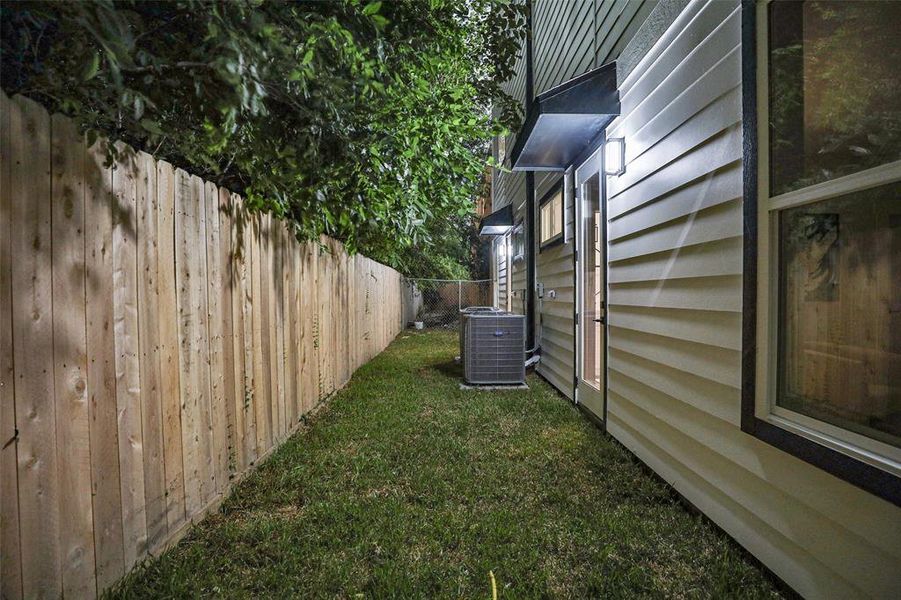 Enjoy a pet-friendly, enclosed backyard perfect for safe outdoor play.