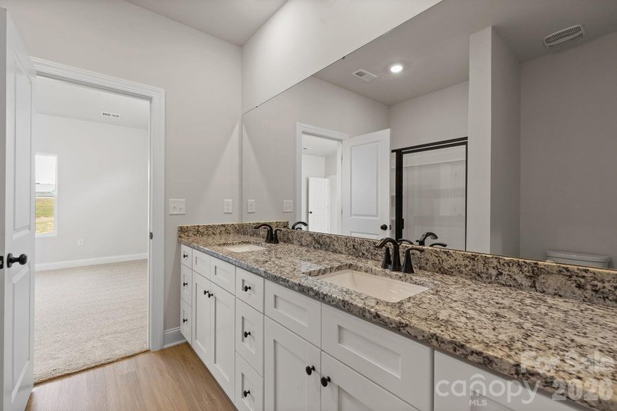 Furnished interior view inside a new home in Ascot Woods, Charlotte (Image 7).